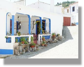Algarve house with plant pots lined outside