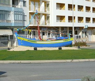 Fishing boat round-about armacao de Pera